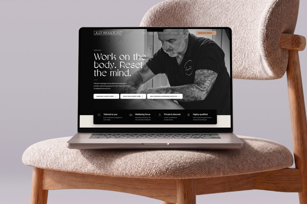 Custom WordPress website for Just Invigorate massage therapy in Chichester, displayed on a laptop